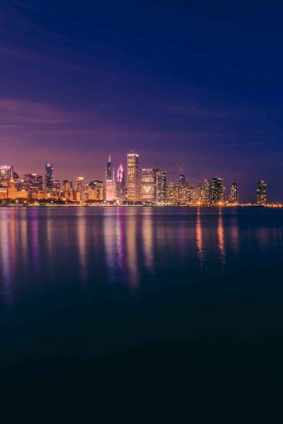 View of the lake and Chicago skyline at night